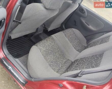 Красный Дэу Ланос, объемом двигателя 1.5 л и пробегом 152 тыс. км за 3150 $, фото 10 на Automoto.ua