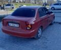 Красный Дэу Ланос, объемом двигателя 1.5 л и пробегом 151 тыс. км за 2100 $, фото 1 на Automoto.ua