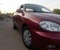 Красный Дэу Ланос, объемом двигателя 1.6 л и пробегом 280 тыс. км за 2600 $, фото 1 на Automoto.ua