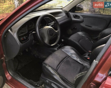 Дэу Ланос 2006 в Косове на Automoto.ua Красный Дэу Ланос, объемом двигателя 1.5 л и пробегом 263 тыс. км за 1518 $, фото 7 на Automoto.ua