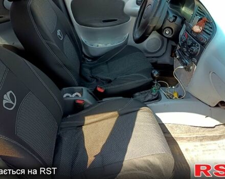 Червоний Деу Ланос, об'ємом двигуна 1.5 л та пробігом 150 тис. км за 1300 $, фото 3 на Automoto.ua