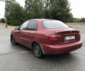 Красный Дэу Ланос, объемом двигателя 1.5 л и пробегом 256 тыс. км за 1932 $, фото 1 на Automoto.ua