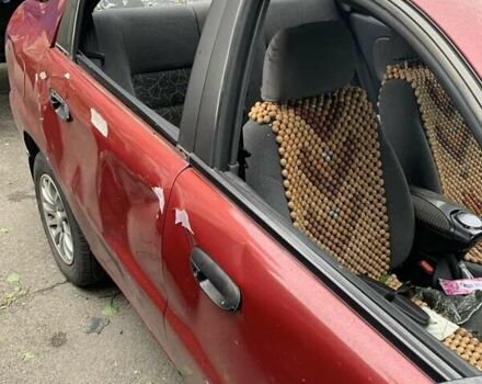 Красный Дэу Ланос, объемом двигателя 1.5 л и пробегом 120 тыс. км за 1600 $, фото 3 на Automoto.ua