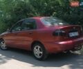 Красный Дэу Ланос, объемом двигателя 1.6 л и пробегом 304 тыс. км за 2900 $, фото 11 на Automoto.ua