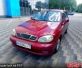 Красный Дэу Ланос, объемом двигателя 1.5 л и пробегом 300 тыс. км за 1600 $, фото 1 на Automoto.ua