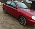 Красный Дэу Ланос, объемом двигателя 1.5 л и пробегом 256 тыс. км за 2900 $, фото 1 на Automoto.ua