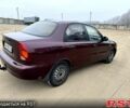 Красный Дэу Ланос, объемом двигателя 1.5 л и пробегом 220 тыс. км за 2350 $, фото 5 на Automoto.ua