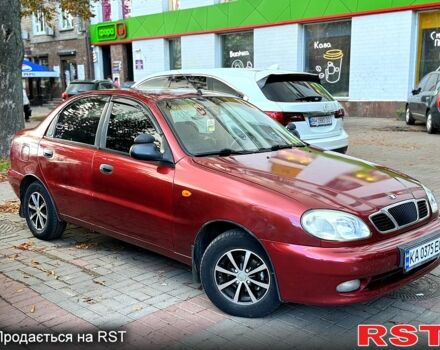 Красный Дэу Ланос, объемом двигателя 1.5 л и пробегом 290 тыс. км за 1950 $, фото 1 на Automoto.ua