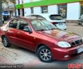 Красный Дэу Ланос, объемом двигателя 1.5 л и пробегом 290 тыс. км за 1950 $, фото 1 на Automoto.ua
