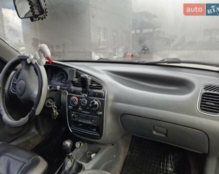 Красный Дэу Ланос, объемом двигателя 1.5 л и пробегом 183 тыс. км за 2700 $, фото 2 на Automoto.ua