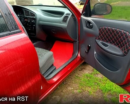 Красный Дэу Ланос, объемом двигателя 1.5 л и пробегом 163 тыс. км за 2200 $, фото 6 на Automoto.ua