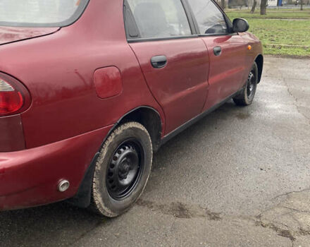 Красный Дэу Ланос, объемом двигателя 1.5 л и пробегом 250 тыс. км за 1450 $, фото 3 на Automoto.ua