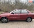 Красный Дэу Ланос, объемом двигателя 1.5 л и пробегом 300 тыс. км за 2100 $, фото 1 на Automoto.ua