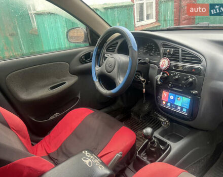 Красный Дэу Ланос, объемом двигателя 1.5 л и пробегом 183 тыс. км за 3000 $, фото 12 на Automoto.ua