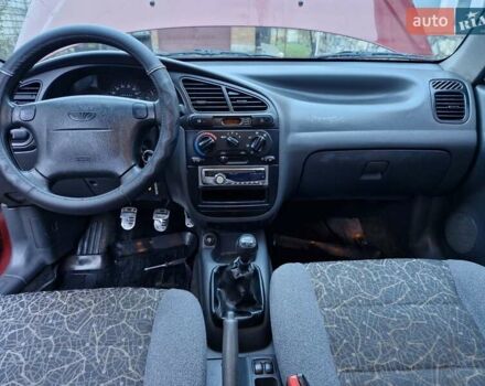 Красный Дэу Ланос, объемом двигателя 1.6 л и пробегом 163 тыс. км за 2650 $, фото 1 на Automoto.ua