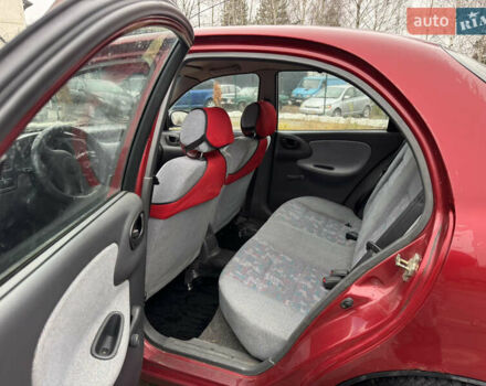 Красный Дэу Ланос, объемом двигателя 1.5 л и пробегом 310 тыс. км за 1850 $, фото 7 на Automoto.ua