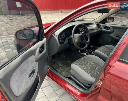 Красный Дэу Ланос, объемом двигателя 1.5 л и пробегом 250 тыс. км за 1950 $, фото 15 на Automoto.ua