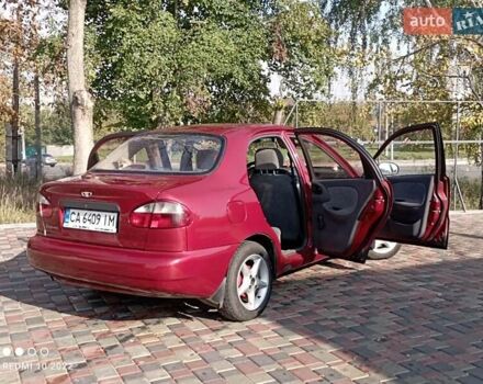 Красный Дэу Ланос, объемом двигателя 1.5 л и пробегом 215 тыс. км за 3000 $, фото 3 на Automoto.ua