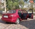Красный Дэу Ланос, объемом двигателя 1.5 л и пробегом 215 тыс. км за 3000 $, фото 3 на Automoto.ua