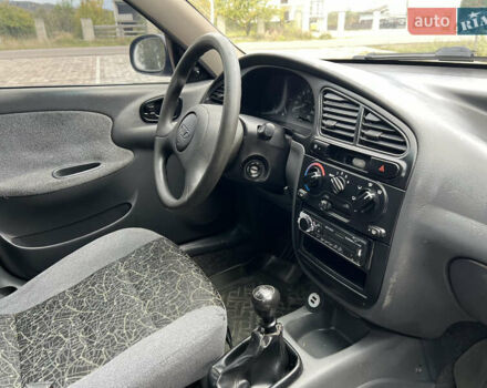 Красный Дэу Ланос, объемом двигателя 1.5 л и пробегом 250 тыс. км за 1950 $, фото 36 на Automoto.ua