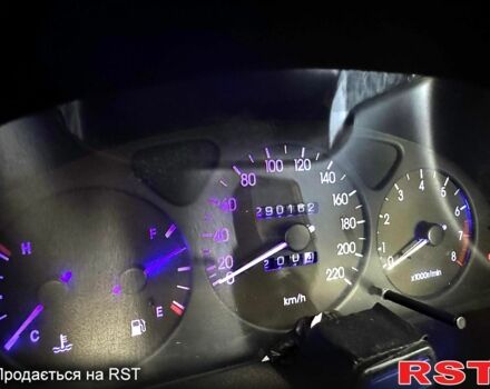 Красный Дэу Ланос, объемом двигателя 1.5 л и пробегом 290 тыс. км за 1950 $, фото 6 на Automoto.ua