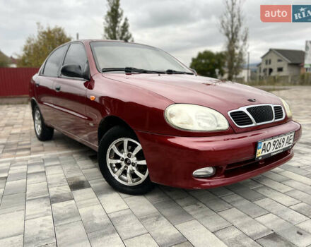 Красный Дэу Ланос, объемом двигателя 1.5 л и пробегом 250 тыс. км за 1950 $, фото 6 на Automoto.ua