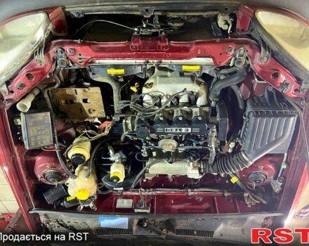 Червоний Деу Ланос, об'ємом двигуна 1.5 л та пробігом 126 тис. км за 1000 $, фото 5 на Automoto.ua