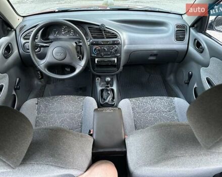 Красный Дэу Ланос, объемом двигателя 1.5 л и пробегом 265 тыс. км за 2300 $, фото 4 на Automoto.ua