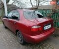 Красный Дэу Ланос, объемом двигателя 1.3 л и пробегом 270 тыс. км за 1500 $, фото 7 на Automoto.ua