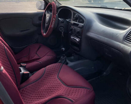Красный Дэу Ланос, объемом двигателя 1.5 л и пробегом 367 тыс. км за 2300 $, фото 6 на Automoto.ua