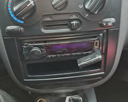 Красный Дэу Ланос, объемом двигателя 1.5 л и пробегом 153 тыс. км за 2000 $, фото 6 на Automoto.ua