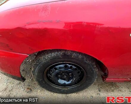 Червоний Деу Ланос, об'ємом двигуна 1.5 л та пробігом 250 тис. км за 1350 $, фото 11 на Automoto.ua