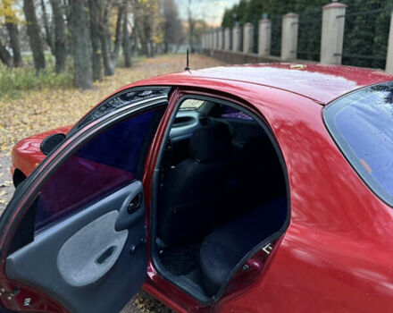 Деу Ланос 2006 у Василькове на Automoto.ua Червоний Деу Ланос, об'ємом двигуна 1.5 л та пробігом 141 тис. км за 1700 $, фото 9 на Automoto.ua