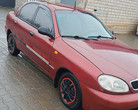 Красный Дэу Ланос, объемом двигателя 1.5 л и пробегом 153 тыс. км за 2000 $, фото 2 на Automoto.ua