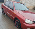 Красный Дэу Ланос, объемом двигателя 1.5 л и пробегом 153 тыс. км за 2000 $, фото 2 на Automoto.ua