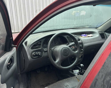 Красный Дэу Ланос, объемом двигателя 1.3 л и пробегом 283 тыс. км за 1500 $, фото 3 на Automoto.ua