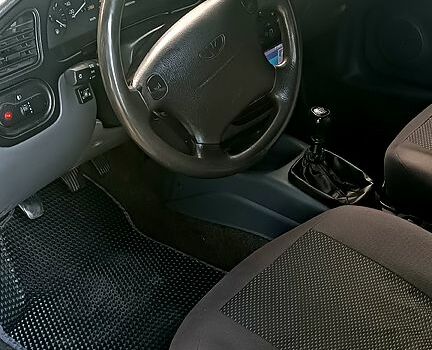 Красный Дэу Ланос, объемом двигателя 1.5 л и пробегом 130 тыс. км за 2700 $, фото 3 на Automoto.ua