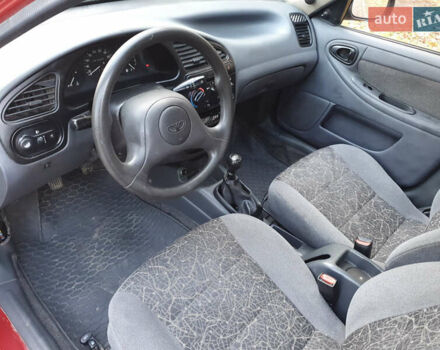 Красный Дэу Ланос, объемом двигателя 1.5 л и пробегом 270 тыс. км за 2450 $, фото 6 на Automoto.ua