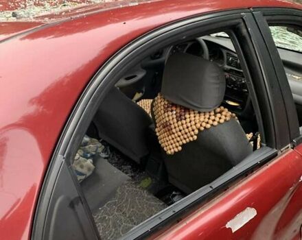 Красный Дэу Ланос, объемом двигателя 1.5 л и пробегом 120 тыс. км за 1600 $, фото 5 на Automoto.ua