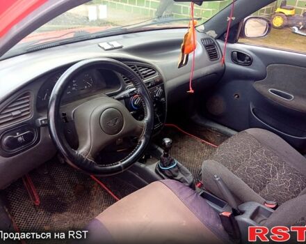 Красный Дэу Ланос, объемом двигателя 1.5 л и пробегом 350 тыс. км за 2000 $, фото 4 на Automoto.ua