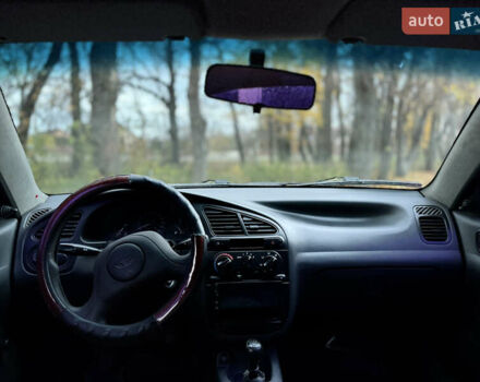 Деу Ланос 2006 у Василькове на Automoto.ua Червоний Деу Ланос, об'ємом двигуна 1.5 л та пробігом 141 тис. км за 1700 $, фото 10 на Automoto.ua