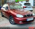 Красный Дэу Ланос, объемом двигателя 1.5 л и пробегом 290 тыс. км за 1950 $, фото 1 на Automoto.ua