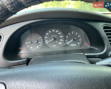 Красный Дэу Ланос, объемом двигателя 1.5 л и пробегом 158 тыс. км за 2500 $, фото 9 на Automoto.ua