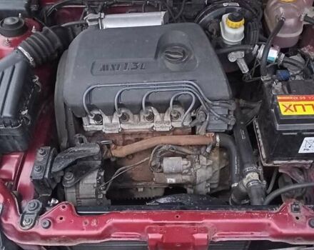 Червоний Деу Ланос, об'ємом двигуна 1.3 л та пробігом 220 тис. км за 1850 $, фото 45 на Automoto.ua