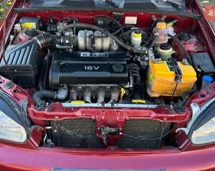 Красный Дэу Ланос, объемом двигателя 1.6 л и пробегом 216 тыс. км за 1900 $, фото 16 на Automoto.ua