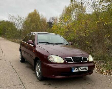Красный Дэу Ланос, объемом двигателя 1.5 л и пробегом 210 тыс. км за 1700 $, фото 1 на Automoto.ua