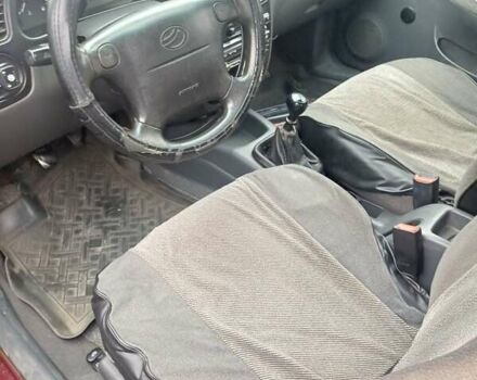 Красный Дэу Ланос, объемом двигателя 1.5 л и пробегом 501 тыс. км за 2400 $, фото 9 на Automoto.ua