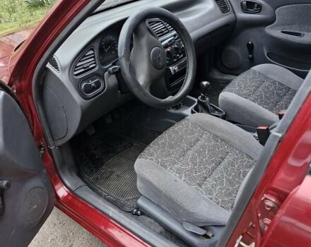 Красный Дэу Ланос, объемом двигателя 1.5 л и пробегом 146 тыс. км за 2300 $, фото 4 на Automoto.ua