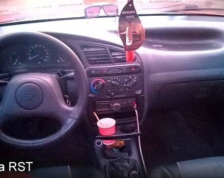 Дэу Ланос 2006 в Полтаве на Automoto.ua Красный Дэу Ланос, объемом двигателя 1.5 л и пробегом 240 тыс. км за 1550 $, фото 4 на Automoto.ua