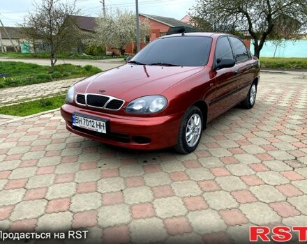 Красный Дэу Ланос, объемом двигателя 1.5 л и пробегом 190 тыс. км за 2650 $, фото 1 на Automoto.ua
